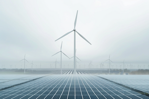 Zdjęcie prezentuje wiatraki, które są symbolem odnawialnych źródeł energii